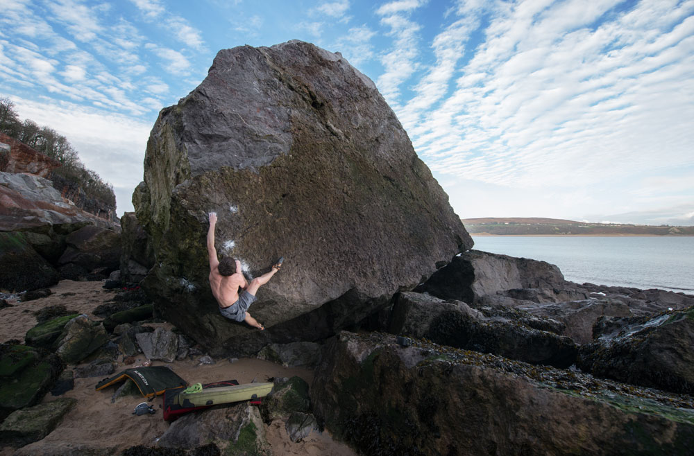 Richard climbing at Oxwich Bay